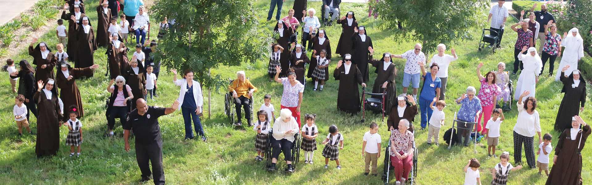 Sisters, Staff, and Hayden Children waving